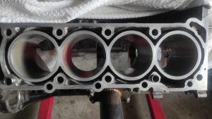 cylinder head rebuild. lapping valves and vacuum testing heads 2