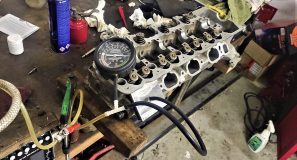cylinder head rebuild. lapping valves and vacuum testing heads 6